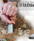 Close-up of Ultralight Titanium Dig Dig Tool For Camping And Backpacking, Compact Trowel Shovel digging in pine needles outdoors