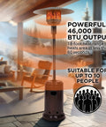 46,000 BTU Portable Outdoor Propane Patio Heater With Wheels, Havana Bronze Finish, shown warming a patio.