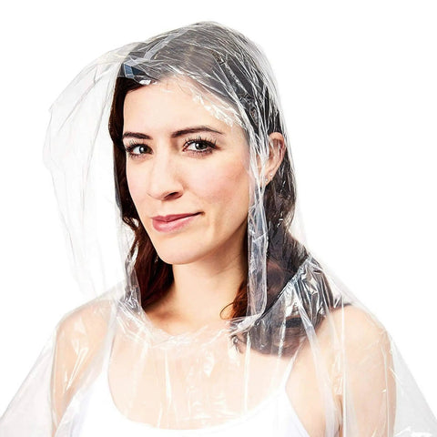 One Size Clear Hooded Disposable Rain Ponchos For Adults Bulk Pack, woman wearing lightweight plastic poncho