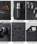 Mixi travel bag with wheels, black; front pocket zipper, side mesh pockets, expandable zipper, waterproof fabric