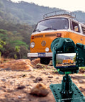 Hassle Free Setup Backpack Ready Low Profile Cheese Plate Mount For Seamless Camera Rigging Compact Flat Tripod Adapter For Dslr Mirrorless Action Cam Creators On The Go capturing vintage VW bus in shot.
