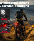 Rider on Powerful Dual Motor 4000W Fat Tire Electric Bike With 52V 25Ah Battery showcasing bright headlights on a trail