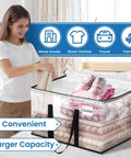 Woman packing clothes in Heavy Duty Clear Moving Bags With Reinforced Handles And Double Zippers, Clear storage tote on bed.