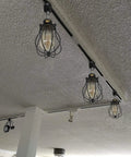 Vintage Wire Cage Semi Track Lighting Heads Black Industrial Rail Light Fixture 3-Pack Dimmable LED Compatible in ceiling setup.