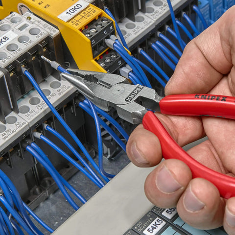Using combo pliers from 4 Piece Automotive Pliers Set In Foam Tray Storage With Combo Pliers, Diagonal Cutters, Long Reach Pliers Straight Nose And Bent Nose For Auto Repair And Maintenance Mechanic Grade Hand Tools to grip wire in electrical panel.