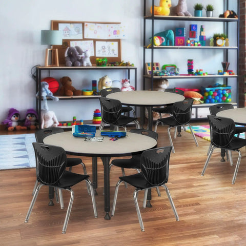 Adjustable Table Legs Set Of 4 In Black And Chrome, Heavy Duty Post Legs For Wood Desks And Tables, Adjusts From 22 To 33 Inches in a classroom setting with children’s tables and toys.