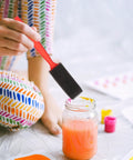 Weekend Warrior Room Revival Kit With Heavy Duty Bristle Rollers And Drip Free Tray To Nail That Smooth Pro Finish On Every Corner Your Next Big Paint Job Demands with a foam applicator dipping into paint.