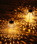 Outdoor Solar Lanterns 2 Pack Waterproof Hanging LED Lights With Metal Star Moon Sun Pattern casting decorative shadows