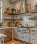 Modern kitchen with black and gold cabinet pulls 30 pack with 3 inch hole center square handles on white cabinets, wood shelves.