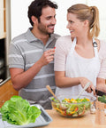 Couple in kitchen with salad, Six Pack Stainless Steel Seed Starter Trays For Germination Seedlings And Water Collection visible