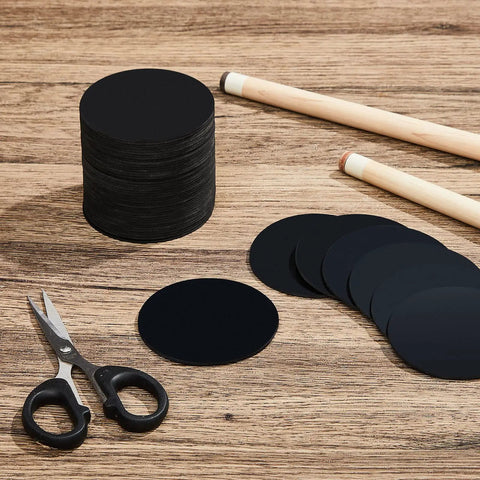 50 Pieces Billiard Pool Table Leg Shims Set 3 Inch Diameter Rubber Levelers on wooden surface with scissors and cue sticks