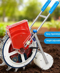 Manual Seed Planter Tool For Garden And Farm Portable Push Seeder With Seed Wheel And Spare Spring in use on soil