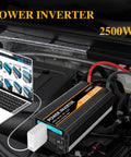 Heavy Duty Badass 2500 Watt Power Inverter Converts 12V Dc To 120V Ac For Trucks And Camper Trailers in engine bay with laptop.