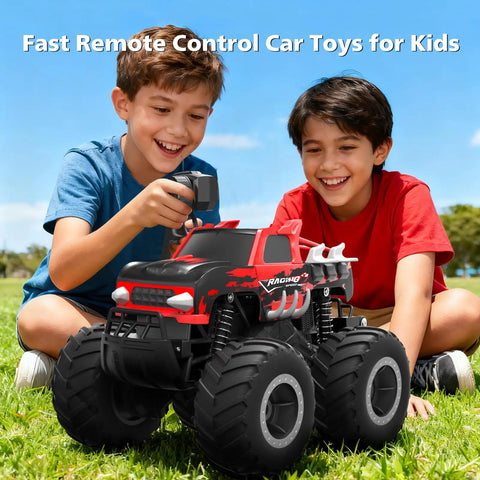 Two kids playing with Amphibious RC Monster Truck 1 16 Scale All-Terrain Off-Road Beast on grass.