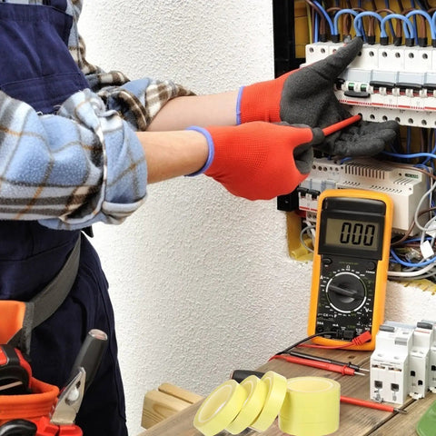 Person using Packove 6Pcs Liquid Rubber Electrical Tape Waterproof Insulation Wrap for wiring with tools and multimeter.