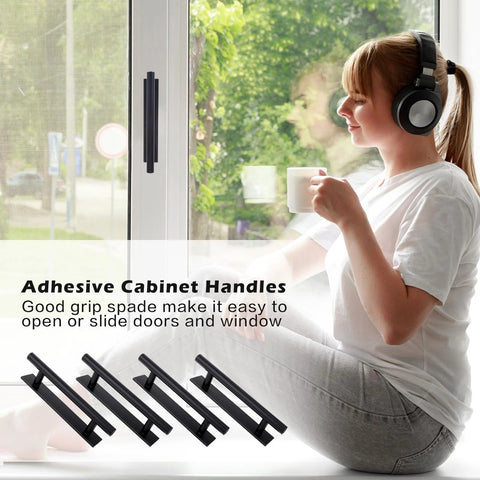 Woman near window using 4 Pack Self Adhesive Cabinet Handles and Drawer Pulls in Black ABS Plastic for easy install without drilling