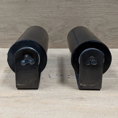 Front view of a pair of 6 inch rubber top guide gate rollers for sliding gates, heavy duty wheels in black, weld on.