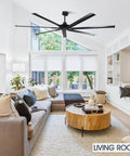 100 Inch Black Industrial Ceiling Fan No Light With Remote Control in a modern living room setting, 7 aluminum blades visible.