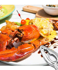 Heavy Duty Crab Leg Crackers Set Four Pack For Shellfish on a table with lobster dinner