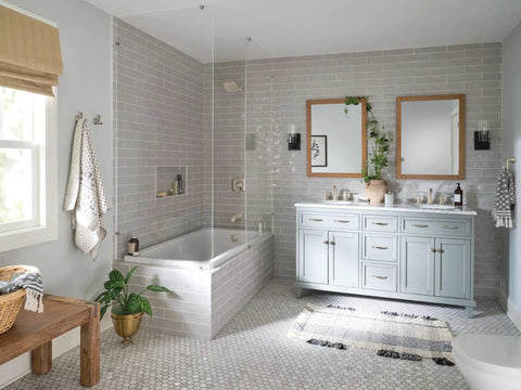 Modern bathroom with double vanity, freestanding bathtub, and Brushed Nickel Double Robe Hook for bathroom and kitchen walls.