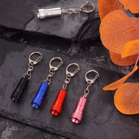 Ten Pack Mini LED Keychain Flashlights With Hooks For Camping And Grab And Go Everyday Carry, Ultra Compact 4 Cm Size, Battery Included, Five Color Assortment With Two Per Color, Travel Ready Night Light For Spontaneous Runs And Quick Fixes