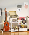 Retro Vinyl Record Player Stand With Adjustable Guitar Holder For Acoustic Or Electric Bass, Huge 150 Album Storage Space, Side Table With Magazine Rack And White Turntable Platform, Cool Vintage Shelf with guitars and records.