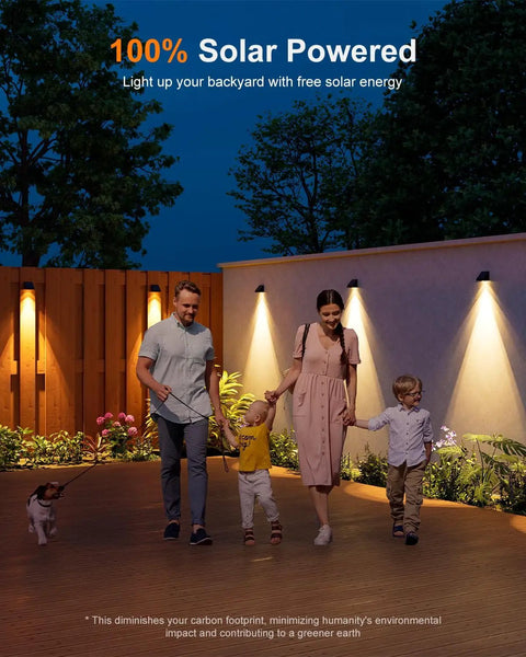 Family walking by wall with 8 Pack Solar Fence Lights With Warm White LED Spot Lens, Outdoor Waterproof Security Lighting