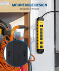 Heavy Duty 6 Outlets Power Strip Surge Protector with 15 Foot Cord UL Listed 900 Joules mounted on a garage wall