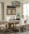 Dining room with elegant crystal chandelier, matte black frame, gold accents, 18" diameter, adjustable 72" chain, above table and chairs.