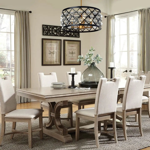 Dining room with elegant crystal chandelier, matte black frame, gold accents, 18" diameter, adjustable 72" chain, above table and chairs.