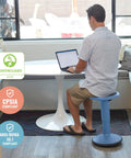 Man sitting on SitWell Wobble Stool With Adjustable Height For Active Seating In Classrooms And Libraries, Powder Blue