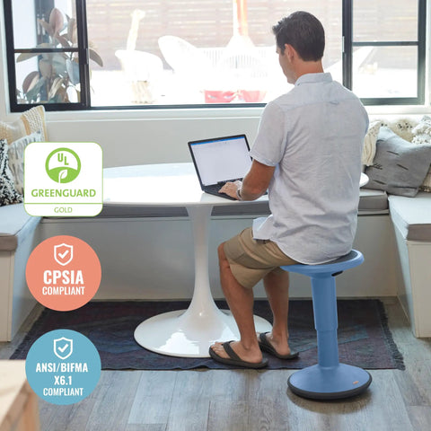 Man sitting on SitWell Wobble Stool With Adjustable Height For Active Seating In Classrooms And Libraries, Powder Blue