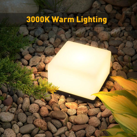 Chill Out In Style With These Modern Warm Led Post Cap Lights That Deliver Luxury Waterproof Vibes Perfect For All Your Fence Deck Garden And Patio Posts E26 Bulb Ready For Awesome Outdoor Living glowing in garden setting