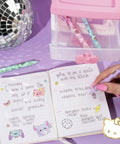 Kawaii Sanrio Pen Set With Four Color Ballpoint Pens Featuring My Melody And Kuromi Glitter Gold Foil Accents Perfect For School And Office Supplies displayed with handwritten notes.