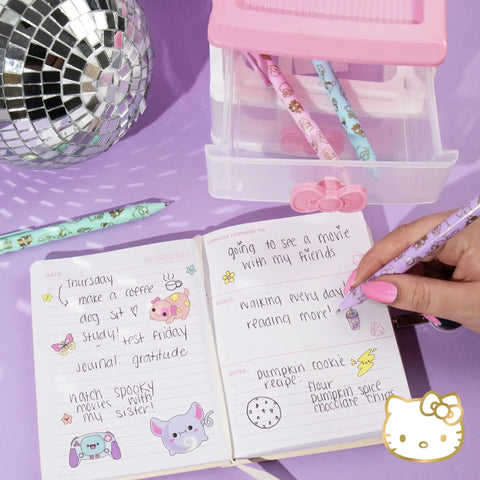 Kawaii Sanrio Pen Set With Four Color Ballpoint Pens Featuring My Melody And Kuromi Glitter Gold Foil Accents Perfect For School And Office Supplies displayed with handwritten notes.