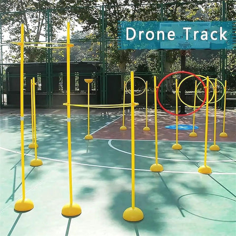 Drone Race Track Obstacle Kit For Indoor And Outdoor Flying set up on outdoor basketball court