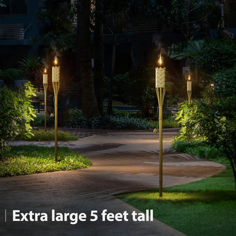 Bamboo Tiki Torches Outdoor Mosquito Repellent 12 Pack, 60 Inch Tall Garden And Backyard Lights, Citronella Oil Lamps illuminated on a path