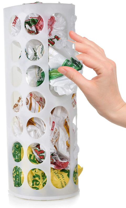 Hand retrieving bag from Large Capacity Bag Dispenser Organizer for Groceries and Laundry Bags, space-saving vertical storage