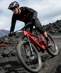 Cyclist on rocky trail with Mountain Bike Handlebar 31.8mm Clamp 780mm Cuttable Width With 35/50/70/90/120mm Rise Options Lightweight T6 Aluminum For MTB Trail And Commuter Riding Ergonomic High Rise Reduces Back And Shoulder Fatigue Black
