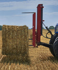 Tractor using Beefed Up 39 Inch Hay Bale Spear With 3600 Pound Capacity Quick Attach Square Bale Spear For Buckets And Loaders
