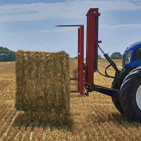 Tractor using Beefed Up 39 Inch Hay Bale Spear With 3600 Pound Capacity Quick Attach Square Bale Spear For Buckets And Loaders