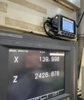 Drip Feed DNC USB Reader For CNC Machines With WiFi Transfer Portable Micro DNC Device attached to CNC control panel