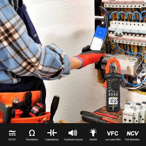 Technician using 6000 Count Bluetooth Clamp Meter With TRMS Digital Multimeter For AC DC Voltage and current testing on circuit board.