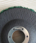 Super Tough 5 Inch Nylon Fiber Flap Disc With 125mm Size And 22mm Arbor Fits Your Angle Grinder close-up view showing nylon fibers and metal arbor.