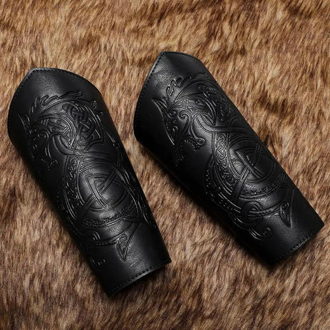 Badass Medieval Faux Leather Bracers Featuring Dragon And Viking Embossing, Adjustable Steampunk Punk Gothic Arm Cuffs, Dope Cosplay Halloween Accessories Set For Tough As Nails Adventure Games And Party Wear on fur background.