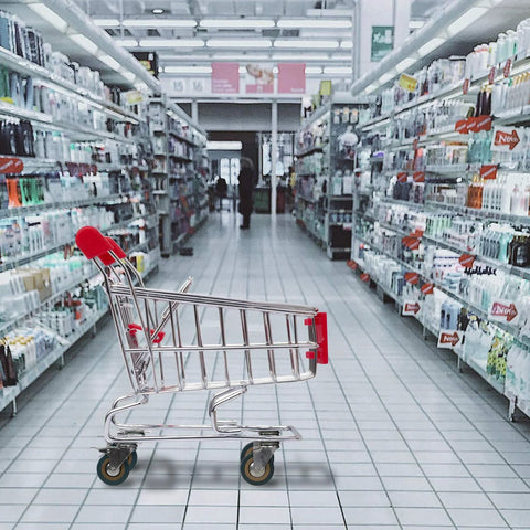 Supermarket aisle with a shopping cart on 8 Pack 3 Inch Swivel Caster Wheels Set With 4 Brakes And 4 Without Brakes PVC Gray