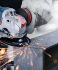Pro Level 5 Inch Angle Grinder With Fully Variable Speed Control And Multi Grip Paddle Switch Powered By A Badass 13 Amp Motor cutting metal.