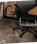 Robust Stainless Steel Retractable Office Chair Footrest Smooth Flip Down Leg Rest under a black office chair with scattered cash.