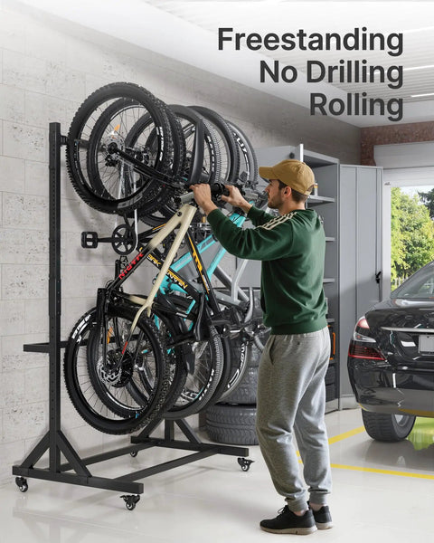 Man using Freestanding Bike Storage Rack for Five Bikes With Built Tough Heavy Duty 350 Lbs Vertical Stand in garage