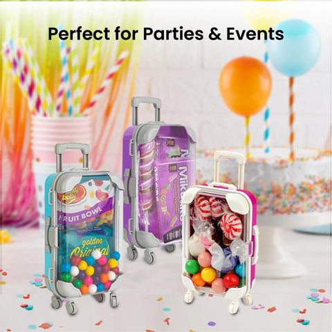 Amazon Hammont mini suitcase party favor boxes, 3-pack in teal, purple, pink with candy inside and wheels.